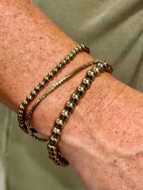 Swimmin’ in Gold bracelet stack