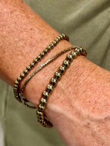 Swimmin’ in Gold bracelet stack