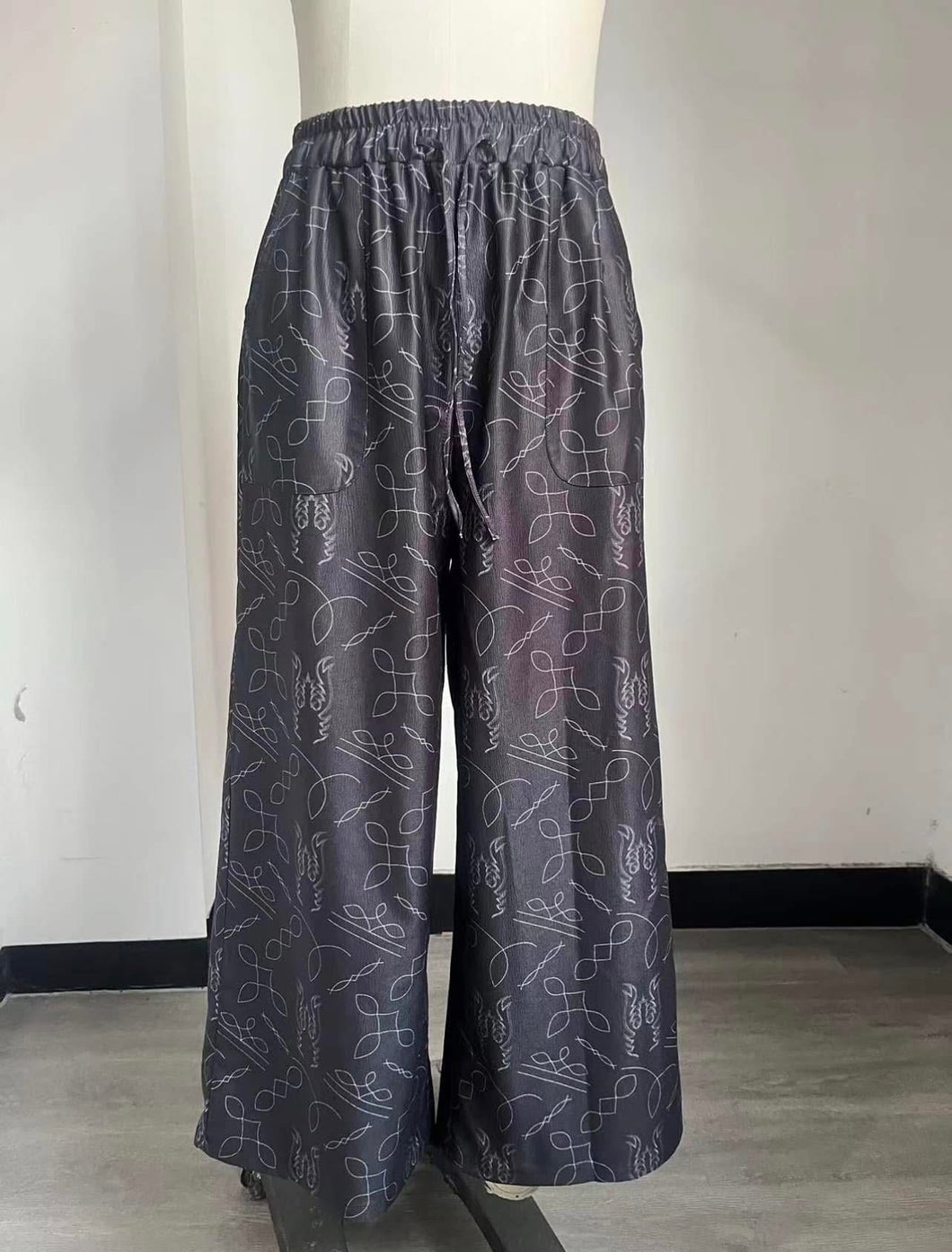 Black boot stitch mesh pants